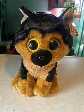 Ty Black and Cream Beanie Plush Dog with Gold-Trim Tag
